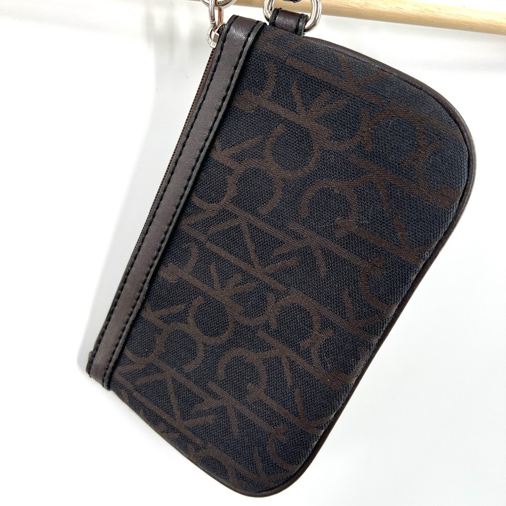 Calvin Klein brown wristlet bag quiet minimalist classic